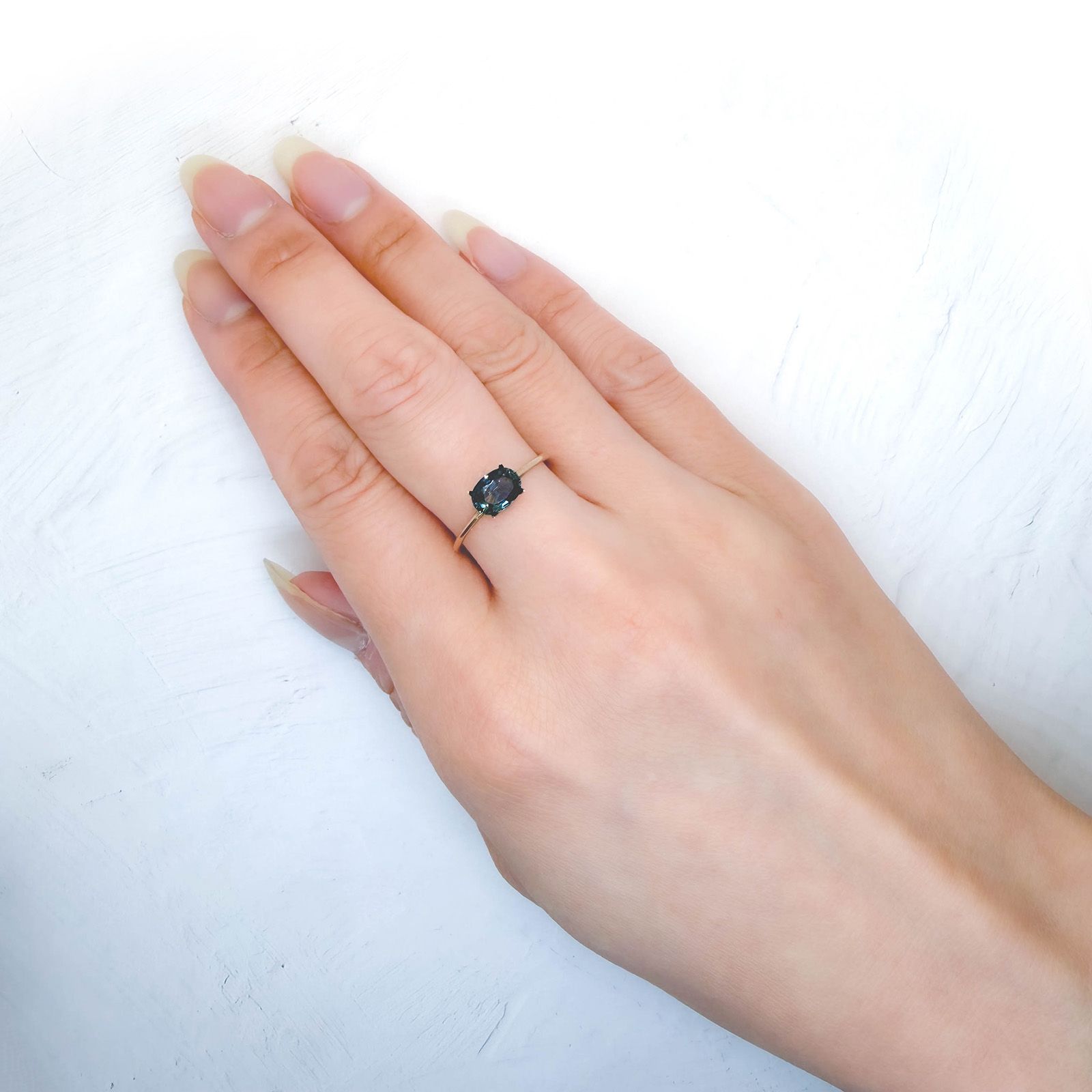 バイカラーサファイア(宝石名バイカラー・サファイア)マダガスカル/オーストラリア産 識別済 1.00ct / 6.9x4.9mm前後 [260814083]
