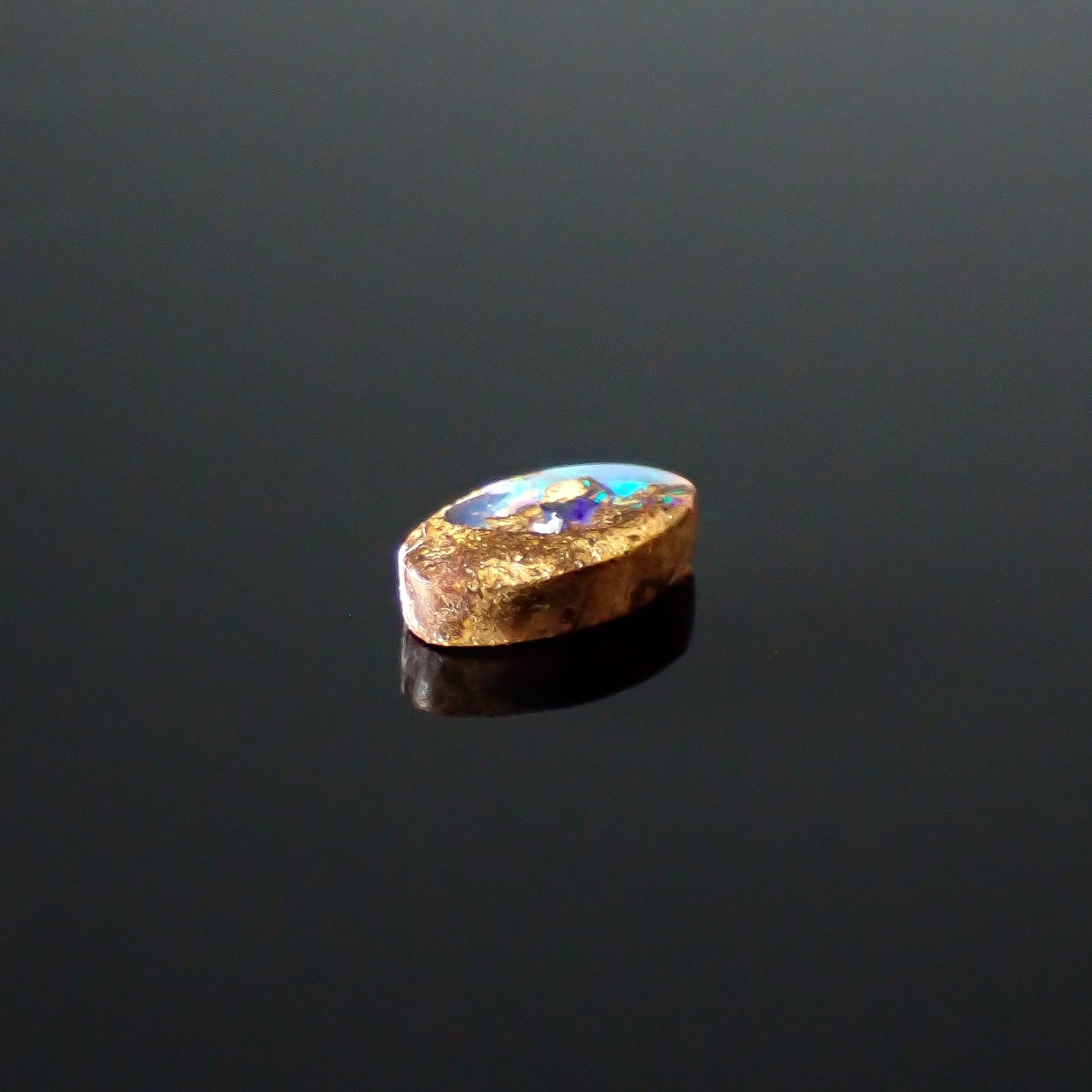 ウッドオパール オーストラリア産 0.28ct / 6.1x3.5mm前後 [251031201]