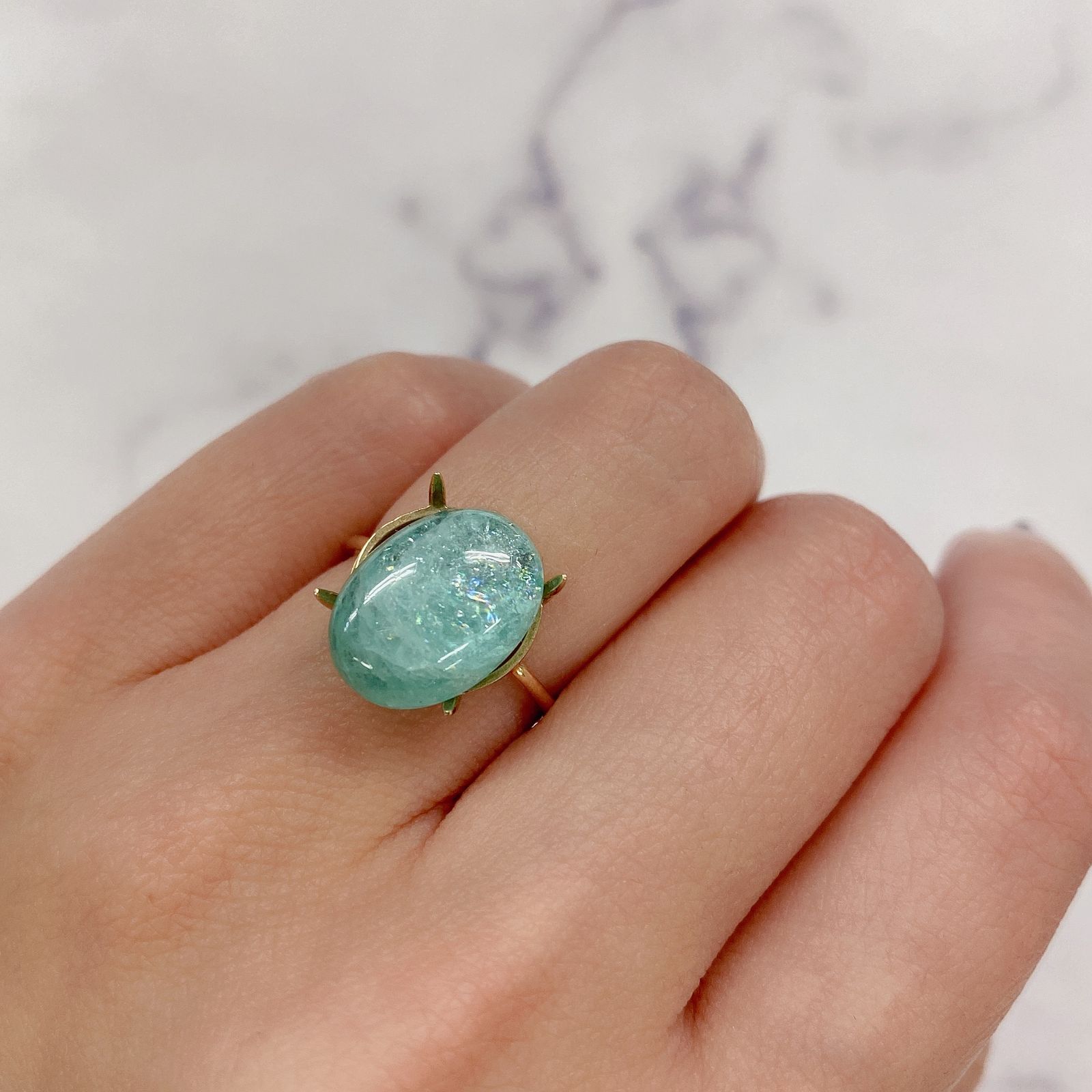 パライバトルマリン(宝石名トルマリン/別名パライバ・トルマリン) モザンビーク産 7.068ct ソ付(宝貴協)[21029494]13.9×10.1mm前後