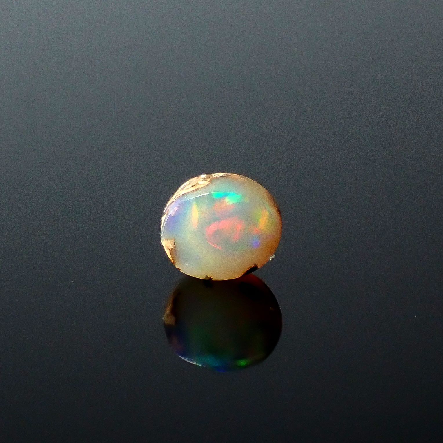 ウッドオパール オーストラリア産 0.32ct / 4.7x3.9mm前後 [251031197]