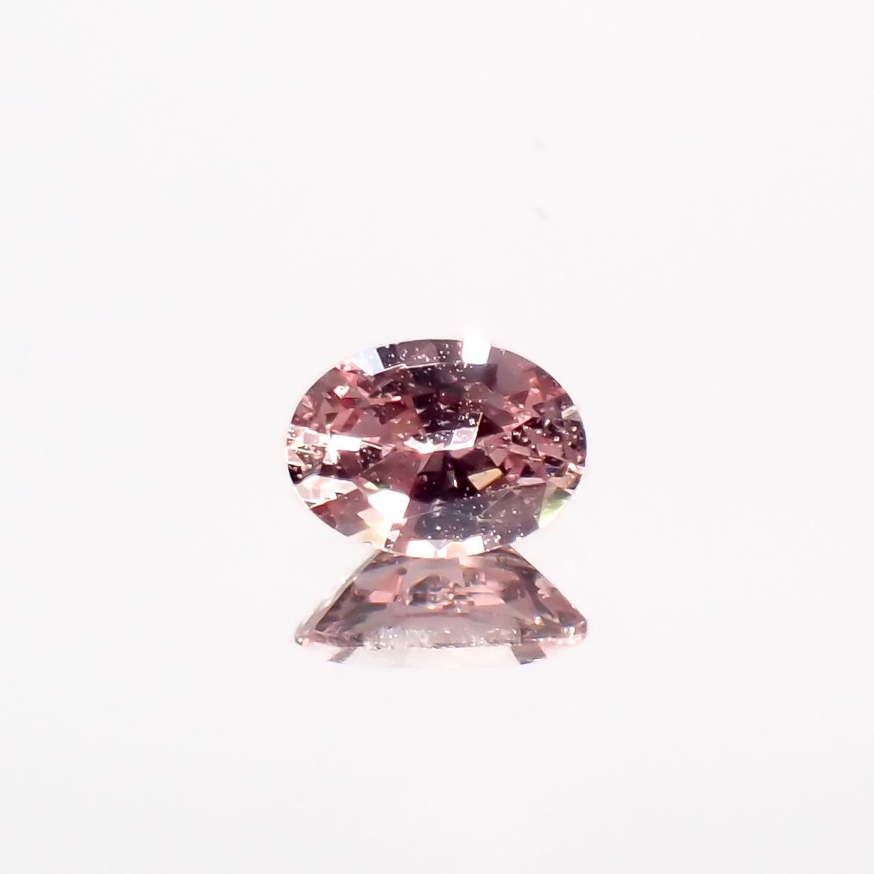 パパラチャサファイア(宝石名サファイア/別名パパラチャ・サファイア)スリランカ産 0.126ct ソ付(日独)[221219642]3.53x2.57mm前後