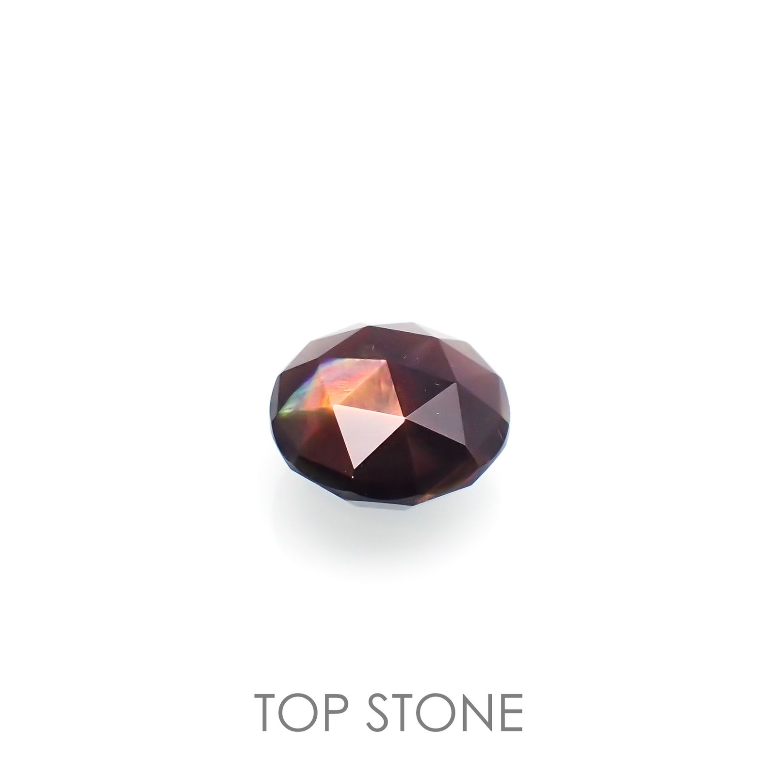 レインボーガーネット(宝石名アンドラダイト レインボー・ガーネット) 日本・奈良県産 8.459ct ソ付(彩珠)[210812938]11.8×11.7mm前後