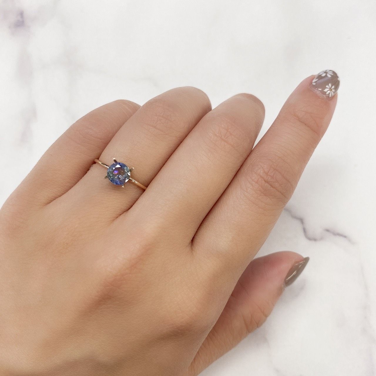 バイカラータンザナイト(ゾイサイト) タンザニア産 ルース 0.72ct[210912657]5.9×5.8mm前後