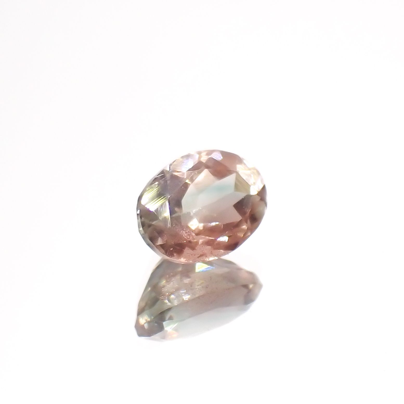 パーティカラーオレゴンサンストーン アメリカ・オレゴン州産 0.73ct[230722842]6.8x4.8mm前後