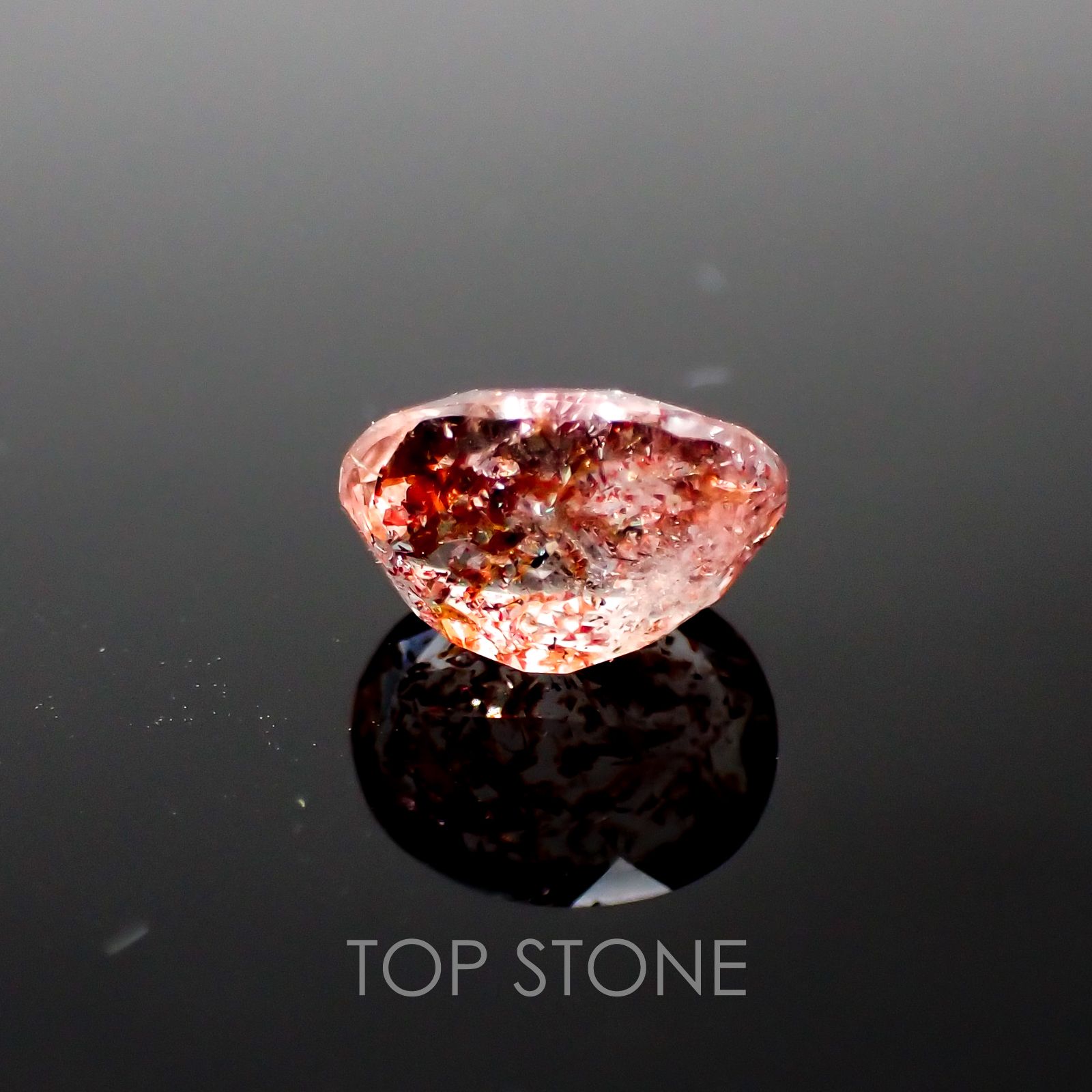 ファイヤークォーツ ナイジェリア産 ルース 1.78ct[210410206]8.6×7mm前後