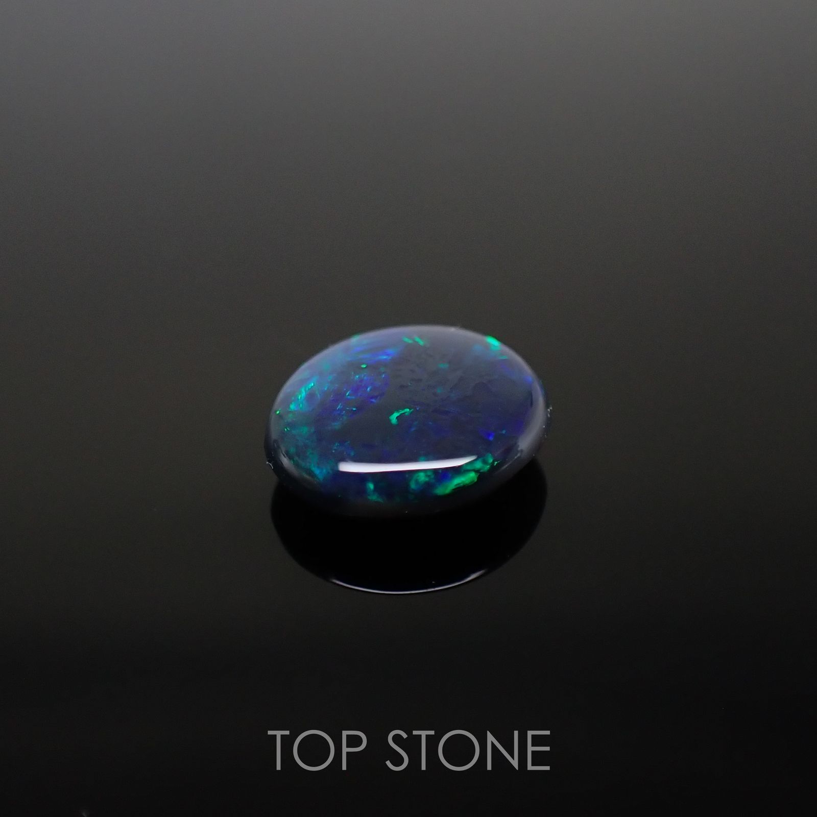 ブラックオパール(宝石名ブラック・オパール) オーストラリア産 1.448ct ソ付(彩珠)[210611324]9.2×8.2mm前後