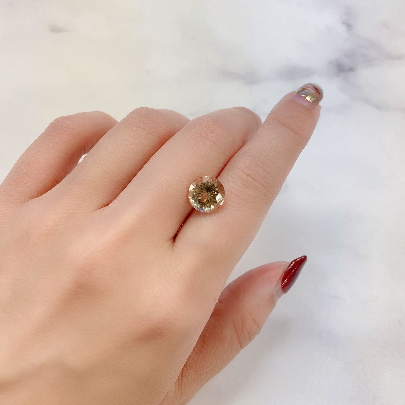 シナモンカラートルマリン(宝石名トルマリン) ナイジェリア産 3.435ct ソ付(彩珠)[20127646]9.6×9.5mm前後