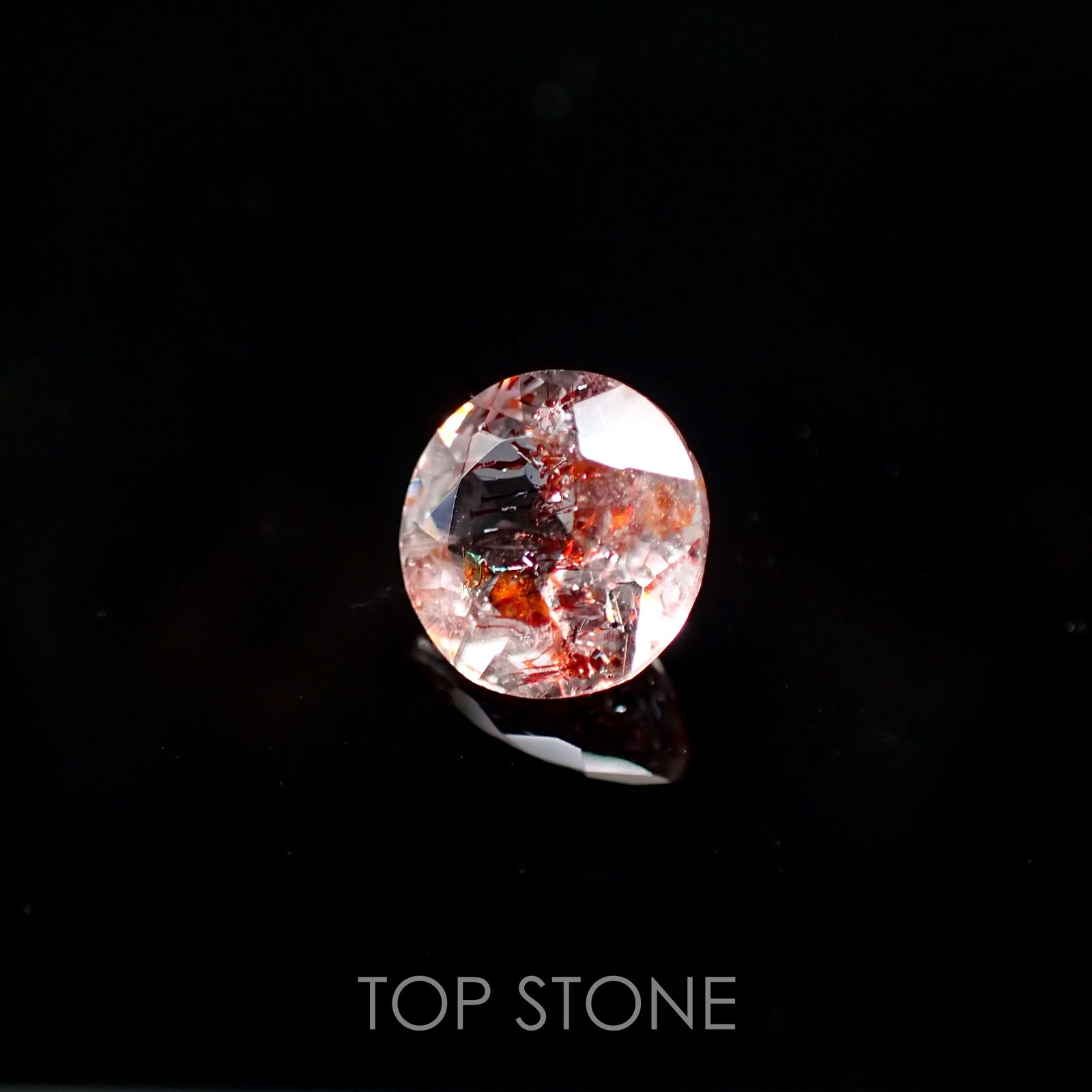ファイヤークォーツ ナイジェリア産 ルース 1.49ct[210510710]7.7×7.7mm前後