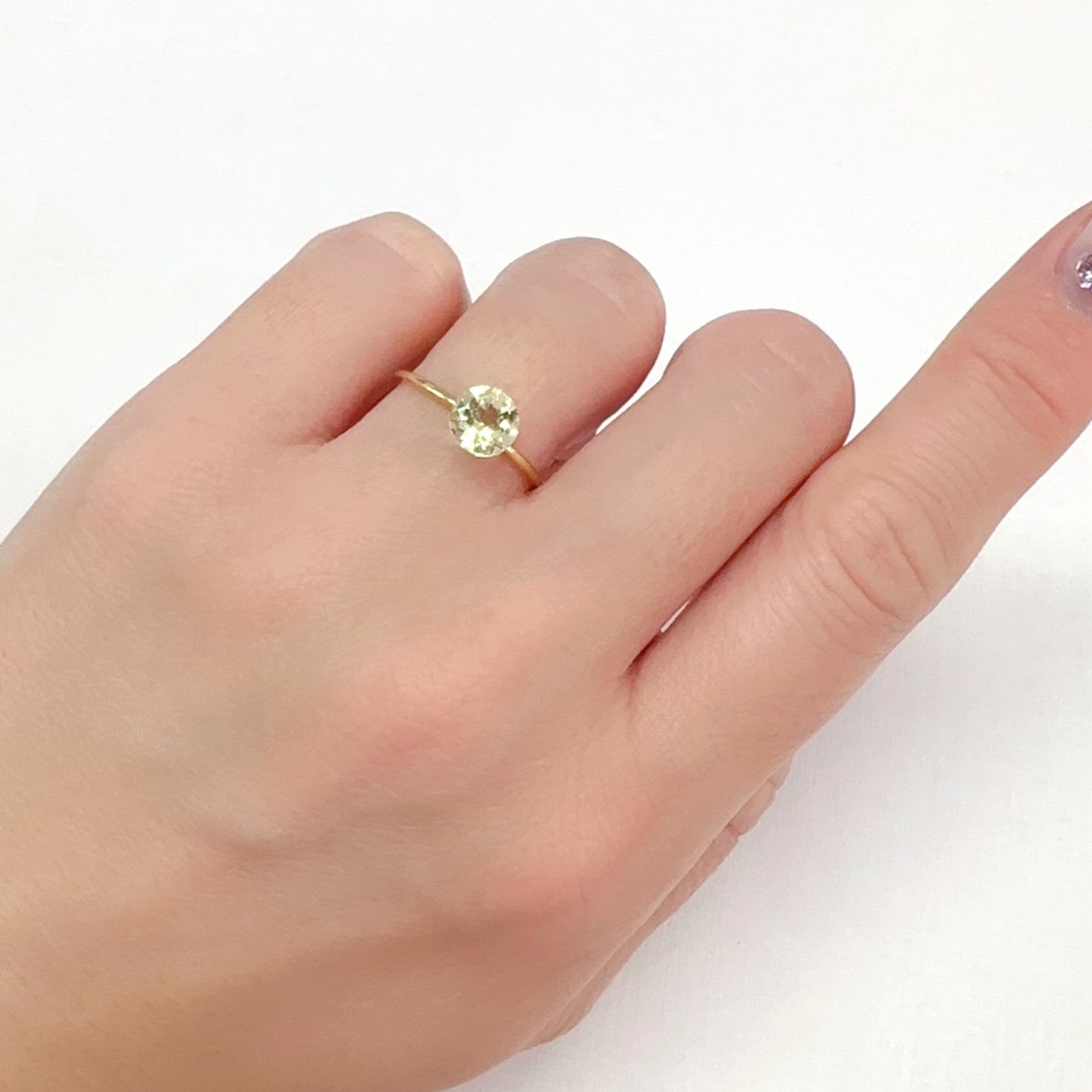 イエローダンビュライト タンザニア産 0.94ct[240125461]6.2x6.2mm前後