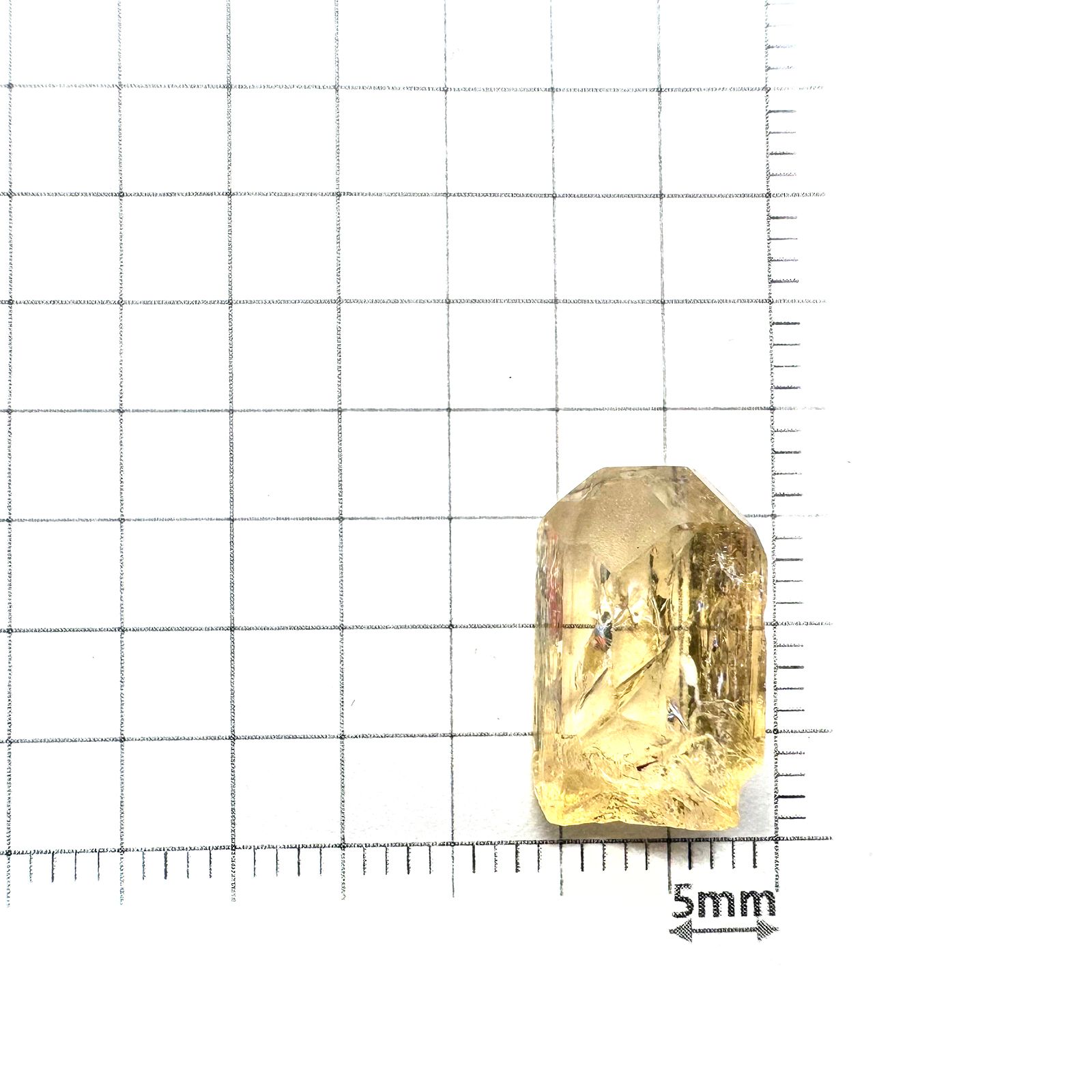 インペリアルトパーズ 原石 ザンビア産 9.95ct / 16.3x10.1mm前後 [250730934]